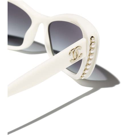 how much is chanel sunglasses|Chanel sunglasses with white trim.